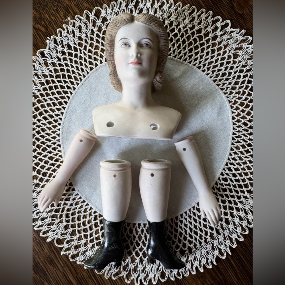 This 1950s doll kit is made of hand-painted porcelain & is marked Japan. BR